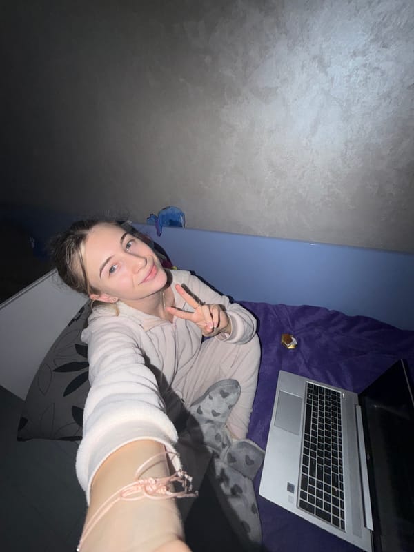 Young couple takes playful selfies indoors in Plovdiv