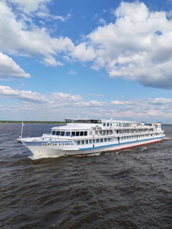 Cruise ship Sergei Yesenin sailing past Krokhino on the river