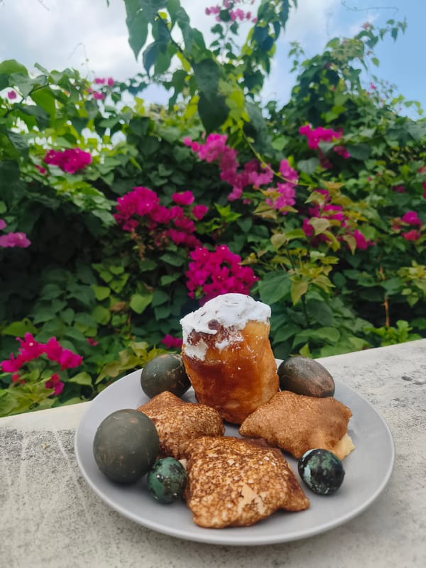 Morning meal photographed amid flowering bougainvillea in Ban Bang Rak