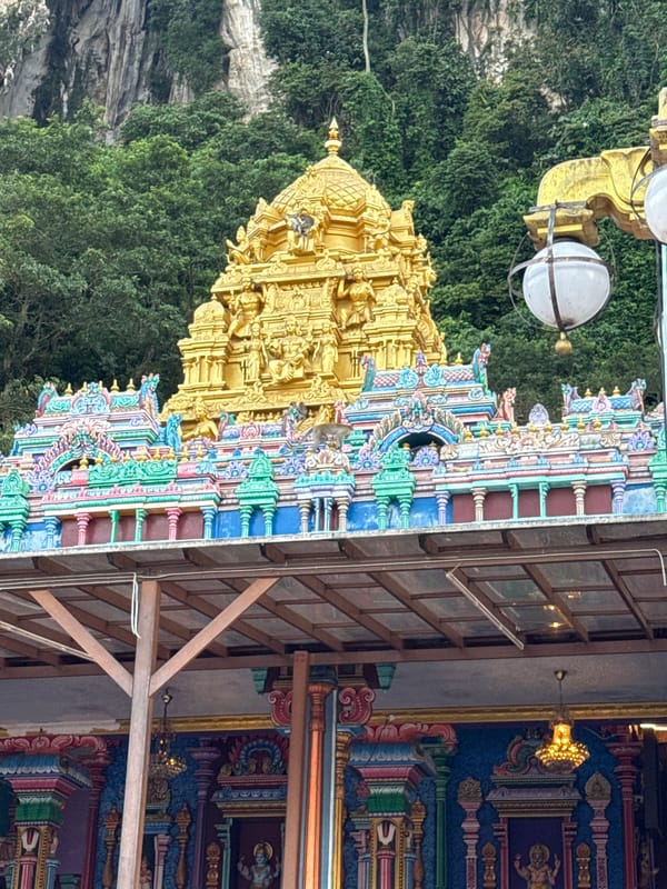 Monkeys interact with visitors at Malaysia's Batu Caves temple