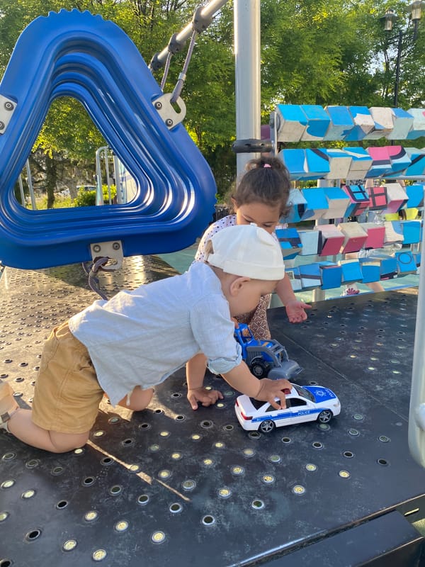 Children play with toy cars at Sevastopol playground