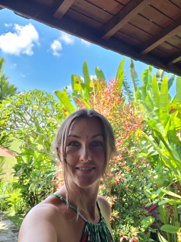 Woman photographed in tropical setting in Lodtunduh, Indonesia