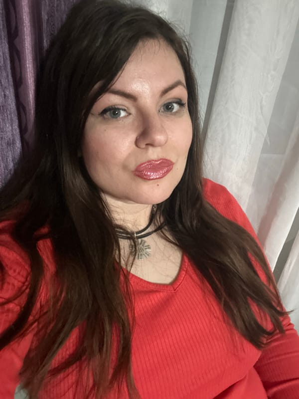 Woman rests on purple surface in Haskovo home