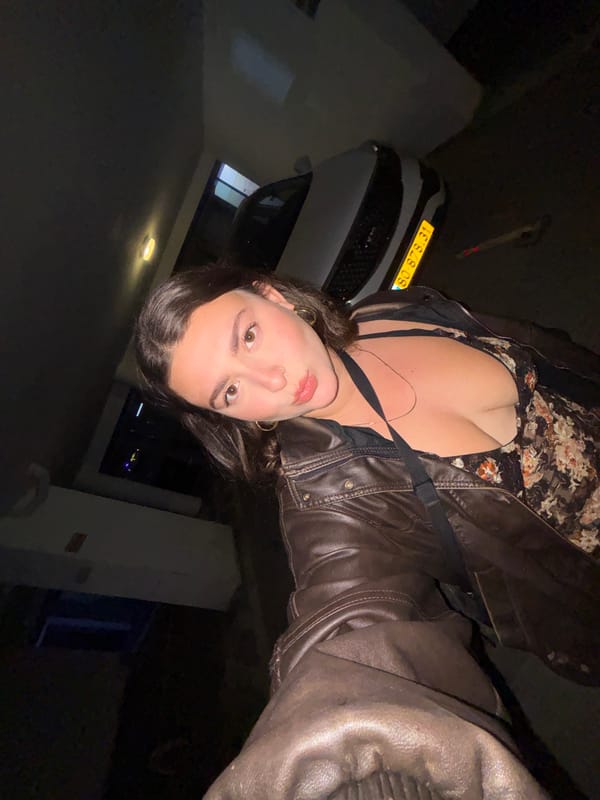 Woman takes nighttime selfie in residential Eilat