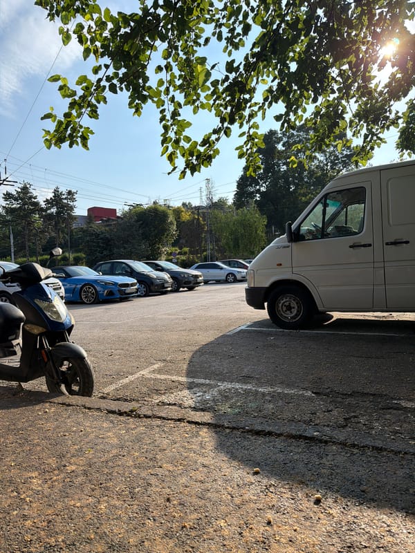 Morning scenes from a Pleven parking lot and rustic restaurant