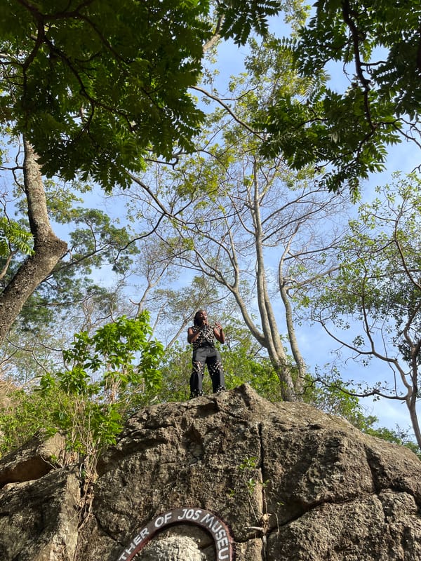Visitors explore rocky landscape in Jos, Nigeria