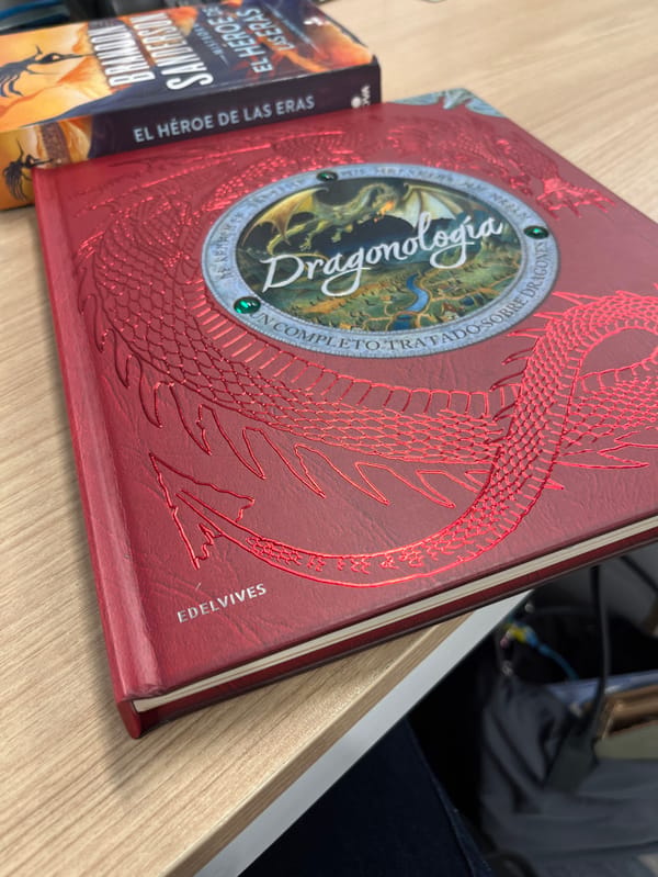 Mexico City resident reads dragon encyclopedia during evening hours