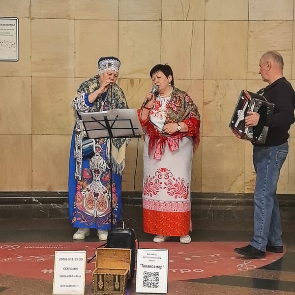 Folk music trio performs in traditional dress in Moscow