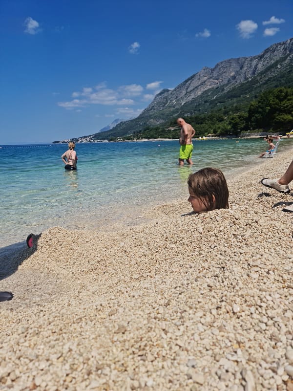 Quiet morning on a pebble beach in coastal Croatia