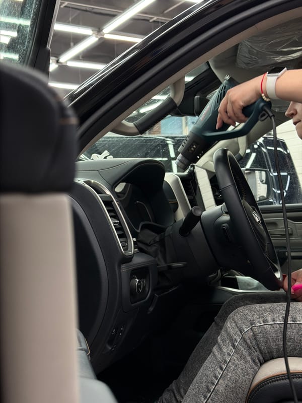 Car detailing service in progress at Krasnoyarsk garage