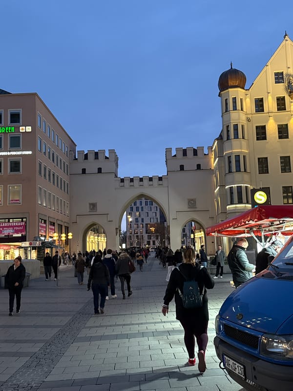 Evening pedestrian traffic observed near Munich's Karlstor