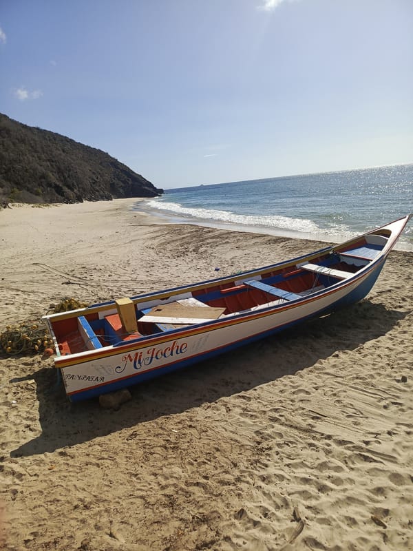 Coastal scenes documented in Guayacán, Venezuela including fishing boat