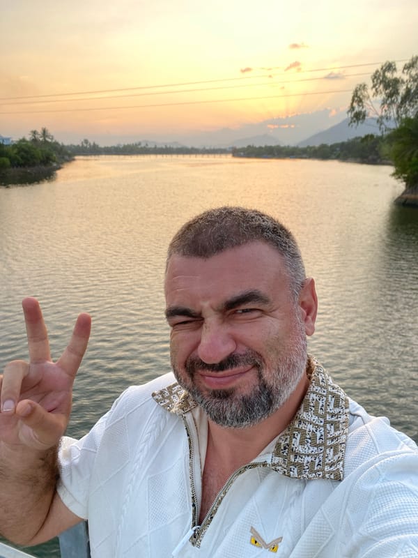 Nha Trang waterfront: selfie, bridge views, and a vivid sunset