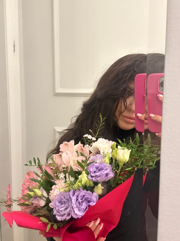 Shopping haul with flowers documented in Krakow bedroom selfies