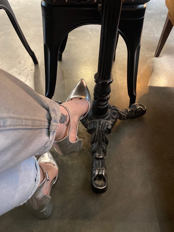 Morning diner spotted at Yekaterinburg cafe wearing silver heels