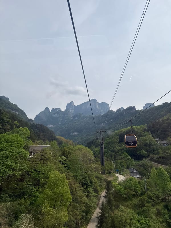 Cable car operates through mountains in Yongding District