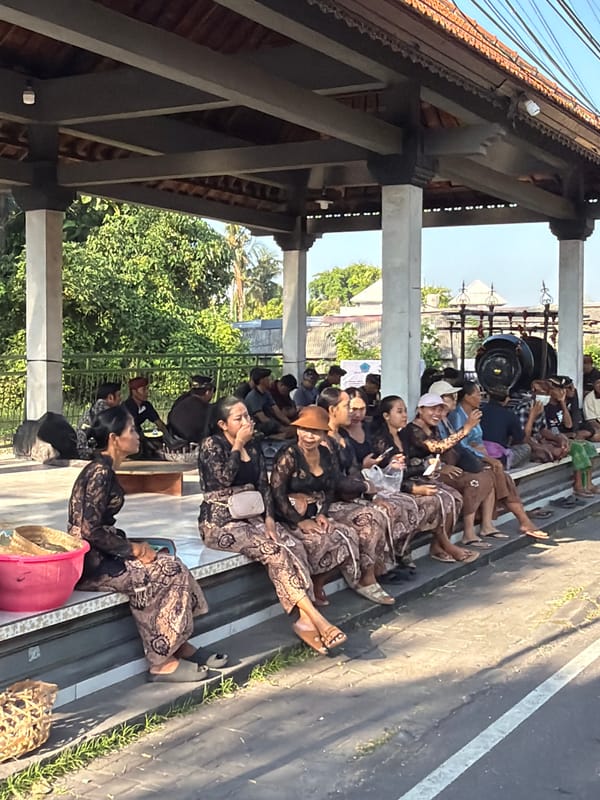 Traditional gathering under a pavilion in Mengwi, Bali