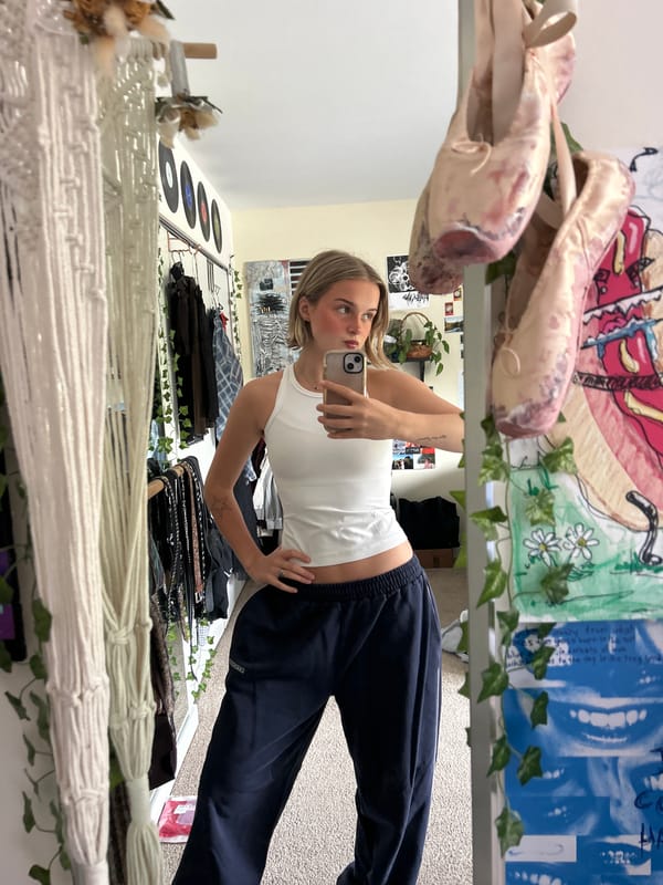 Woman takes selfies in mirror in Whistler
