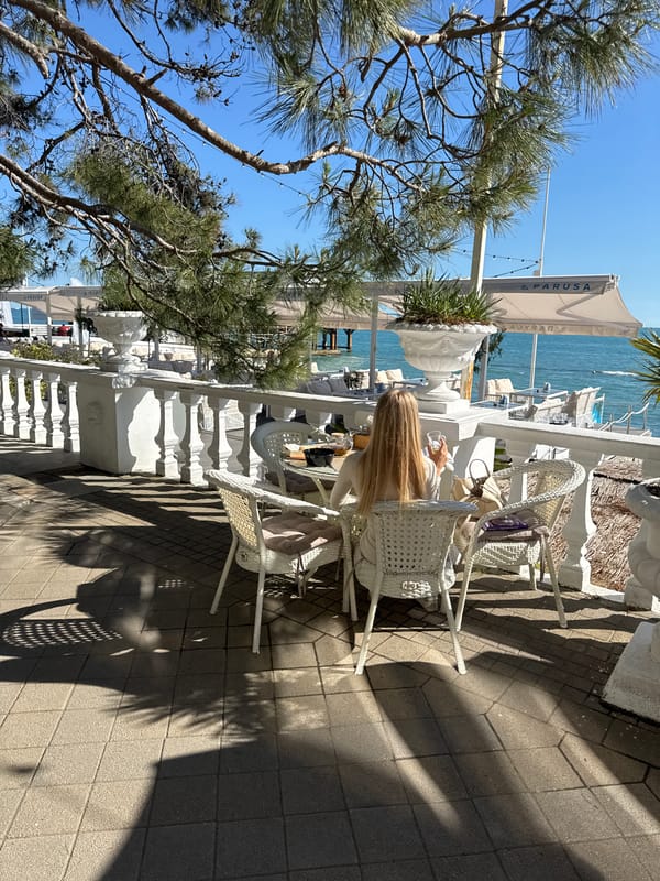 Sunny afternoon at seaside cafe terrace in Sochi documented