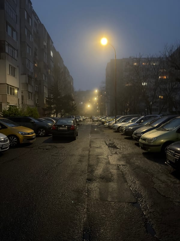 Foggy evening street scene and amusement park documented in Burgas