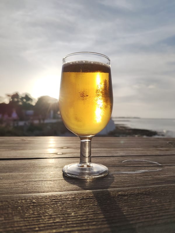 Sunset beers overlooking Mediterranean coast in Dénia, Spain