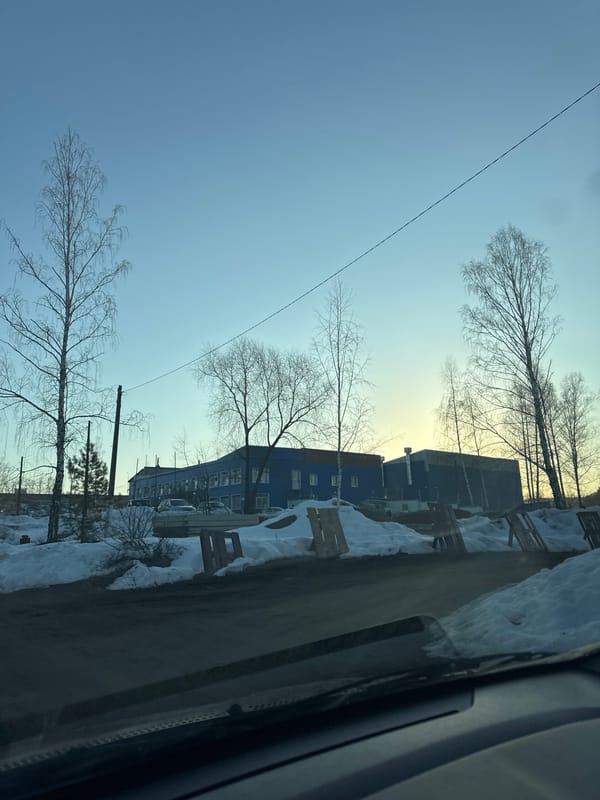 Winter car journey documented through Chaikovsky, Russia streets