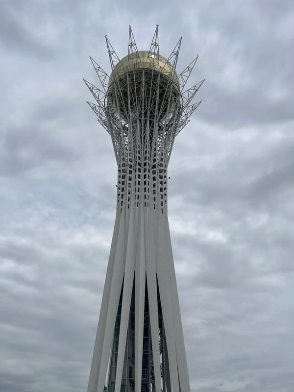 Bayterek Tower, Astana, under cloudy skies