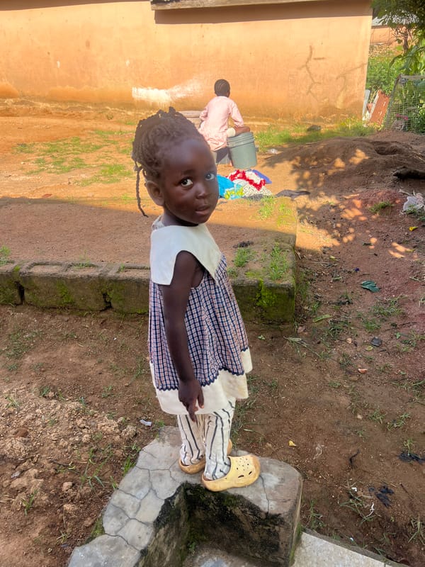 Kids spending a quiet morning outside in Jos, Nigeria