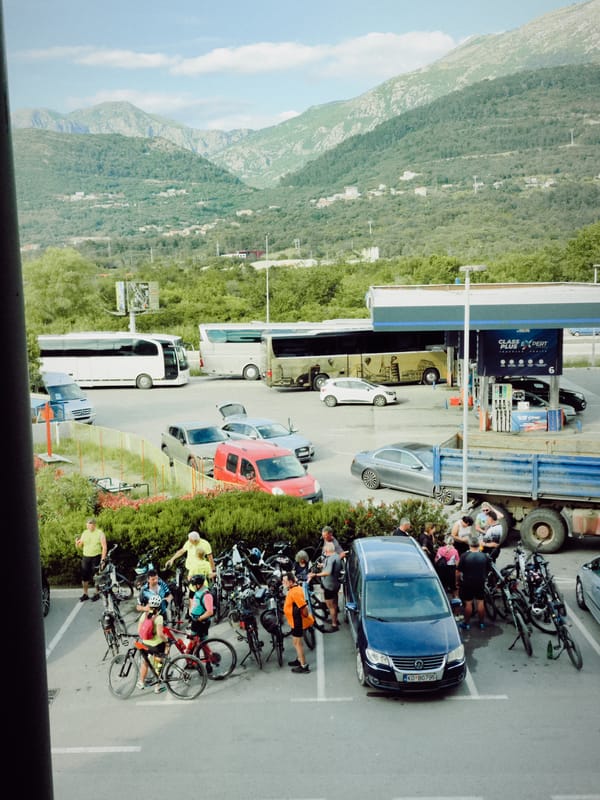 Cycling group takes rest stop at Montenegro gas station