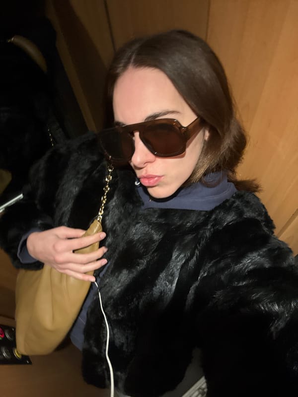 Woman takes elevator selfie in Paris