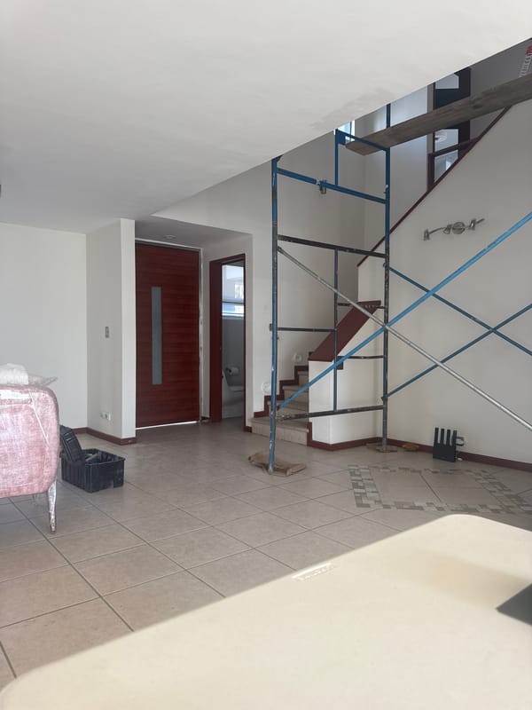 Scaffolding blocks staircase inside Puebla building