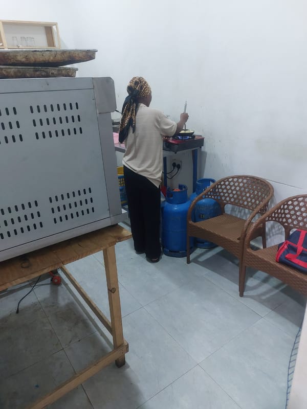 Evening documentation of appliance store and street scenes in Dar es-Salaam
