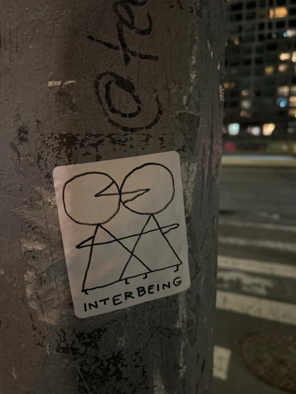 Hand-drawn geometric sticker documented on NYC surface