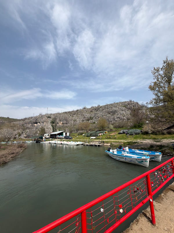 Passenger boats docked along river in Lukovit, Bulgaria