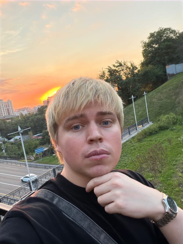Tourist captures sunset selfie over Almaty cityscape