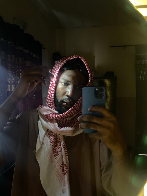 Man Takes Mirror Selfies in Lokoja, Nigeria