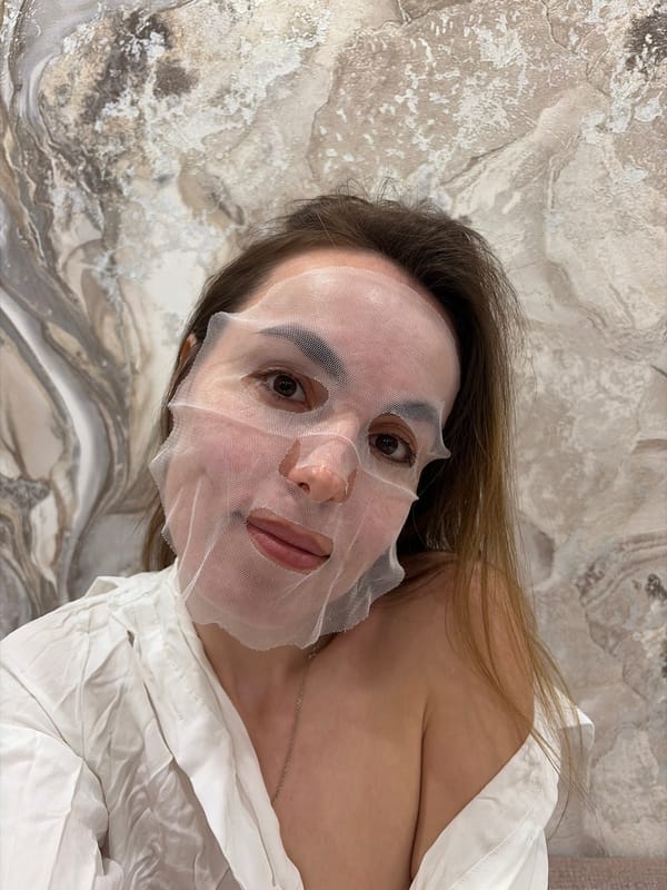 Woman's evening skincare routine documented in Izhevsk apartment