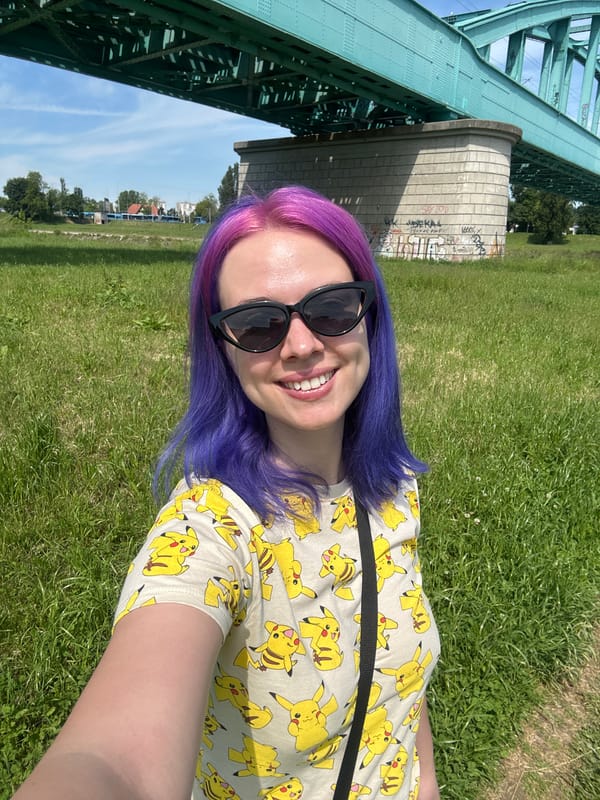 Casual park moment captured in Zagreb with colorful-haired person, dog