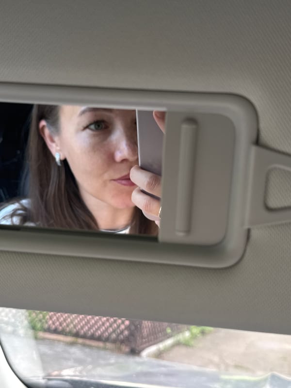 Selfie session across a car and salon in Chaikovsky