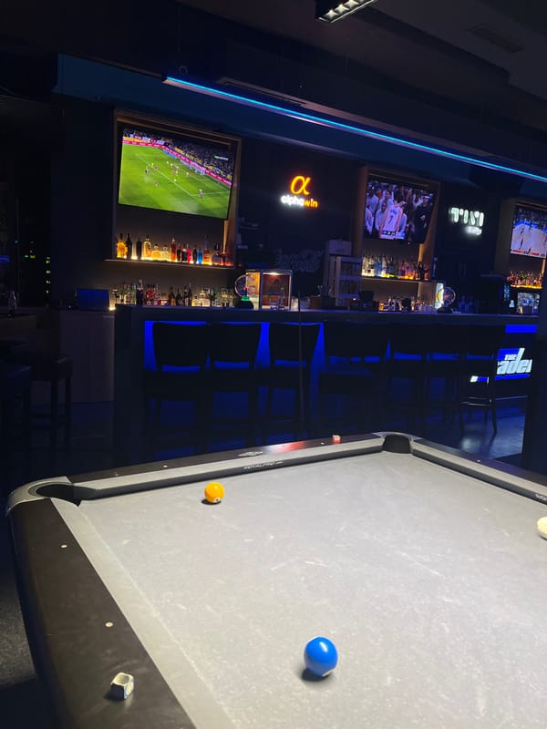 Bar interior with pool table captured in Sofia