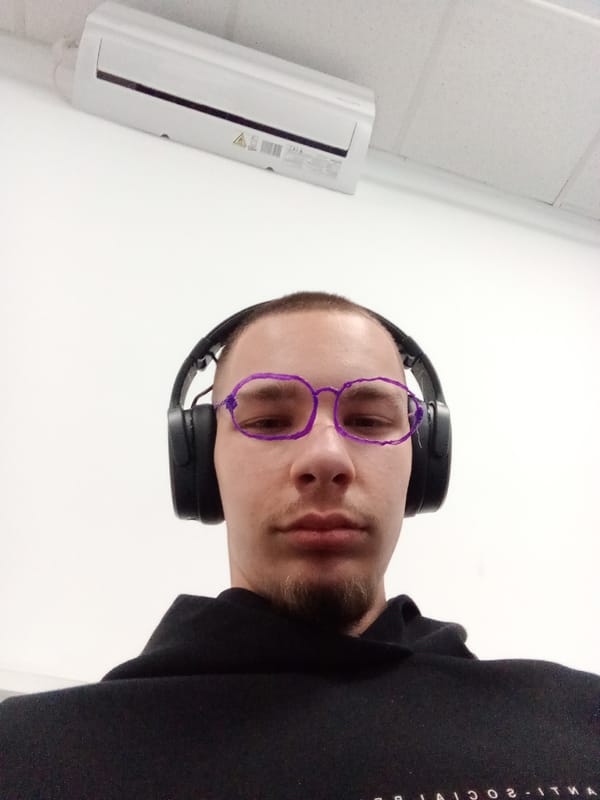 Young man in headphones photographed indoors in Bulgaria