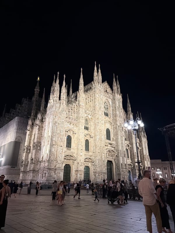 Nighttime documentation of illuminated Milan Cathedral architecture and interiors