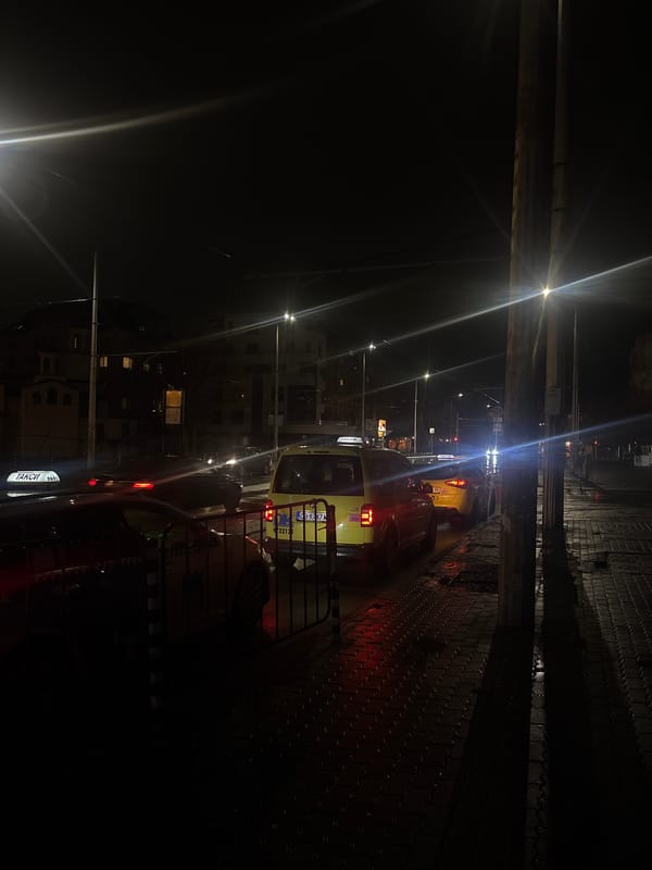 Evening scenes of people and taxis in Sofia