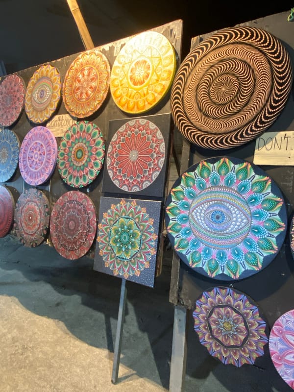 Street vendors display art, plants, clothing in Baan Kai