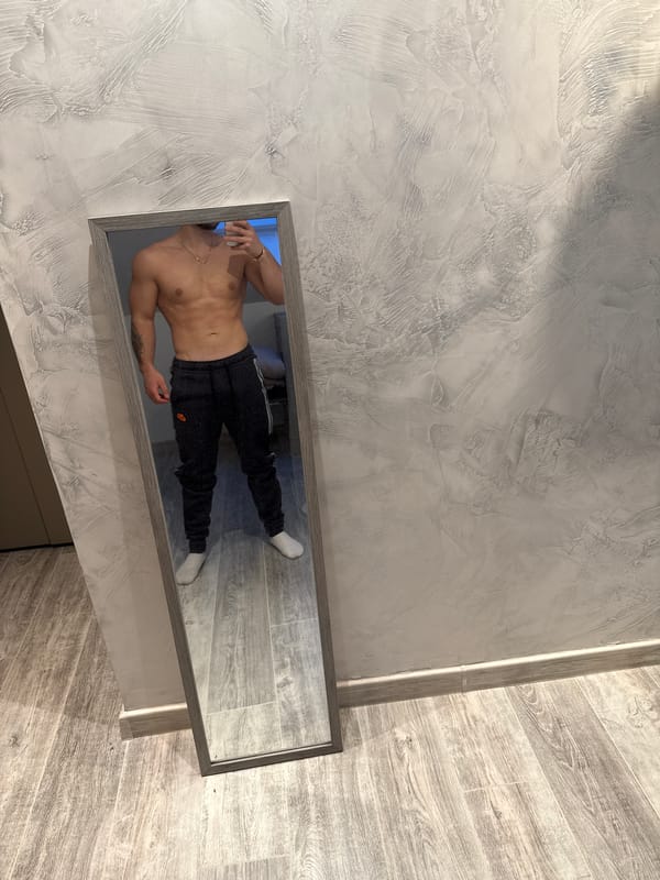 Man Takes Mirror Selfie in Gabrovo Bathroom