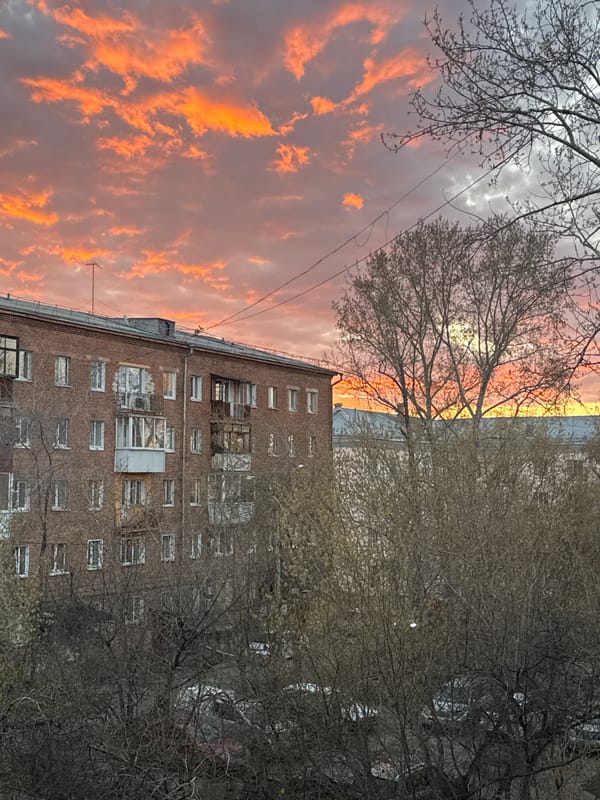 Sunset photographed over brick building in Irkutsk, Russia