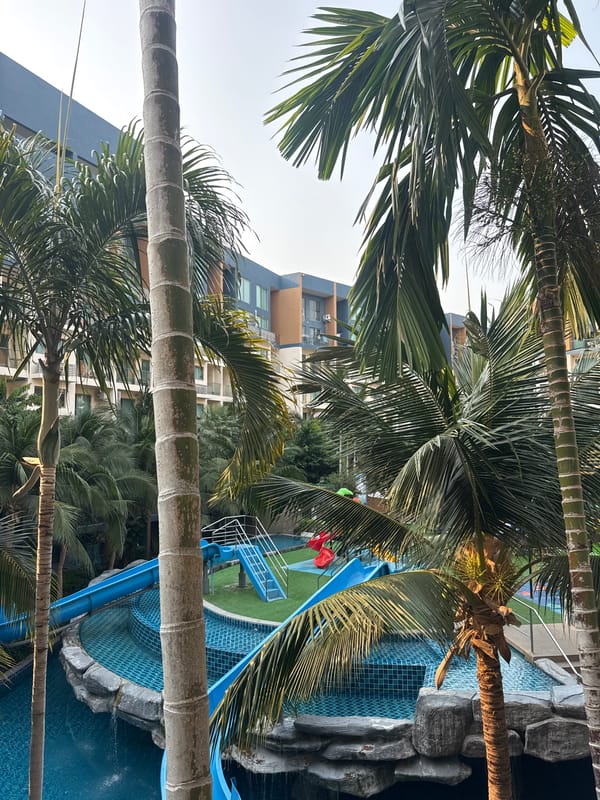 Tourist documents tropical resort scenes in Pattaya Thailand