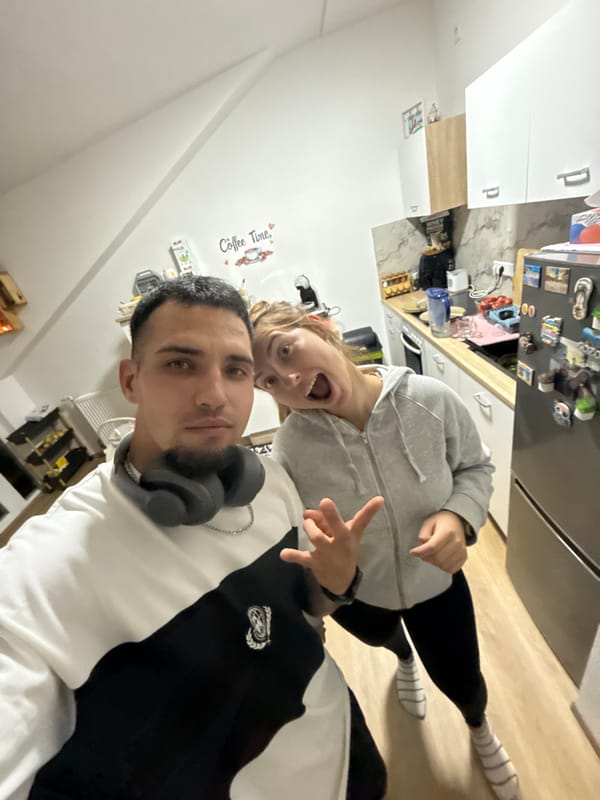 Young man's evening photo session in Garmisch-Partenkirchen apartment