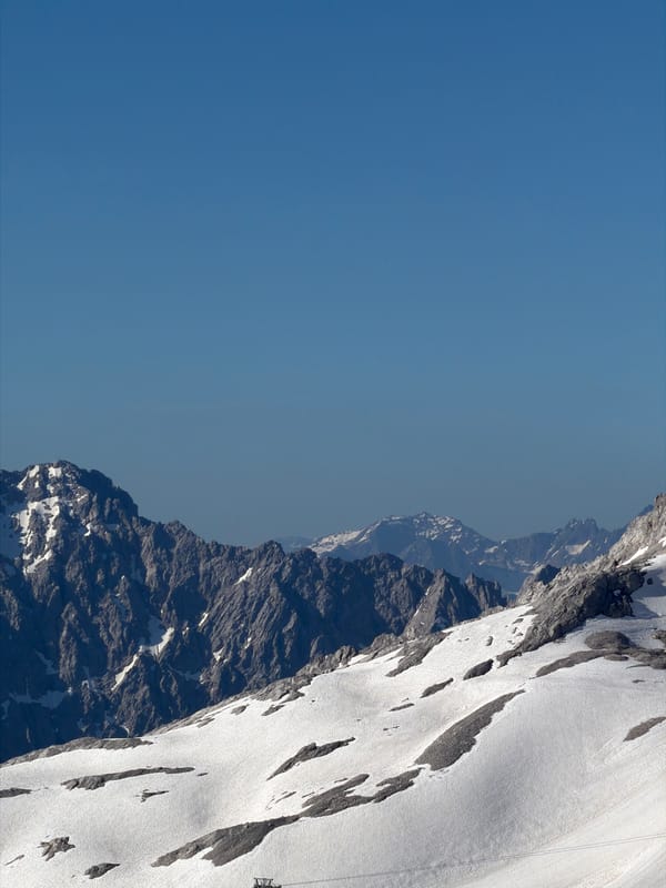 High alpine panorama above Garmisch-Partenkirchen in summer snow