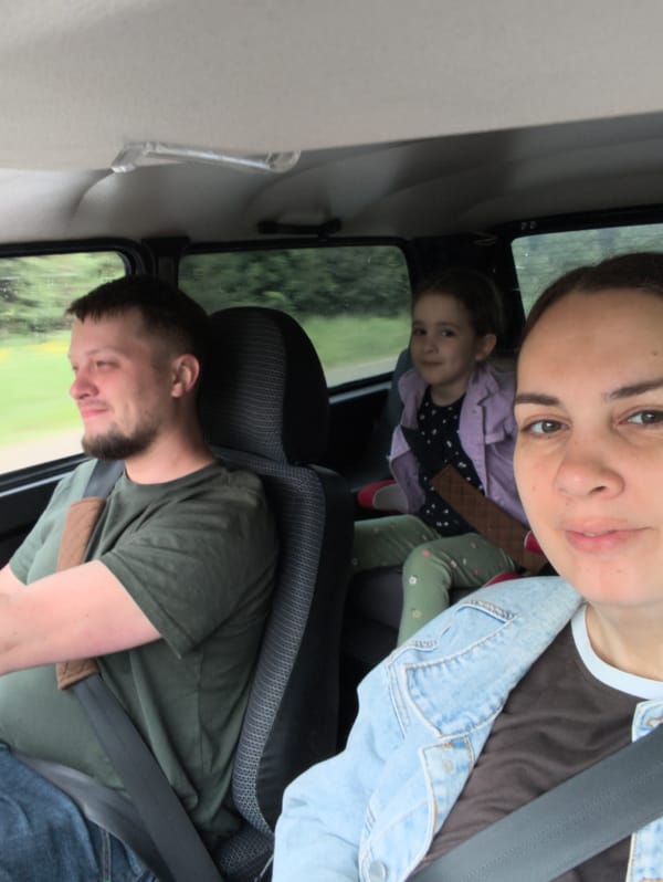 Family captures car selfie during daytime journey in Russia